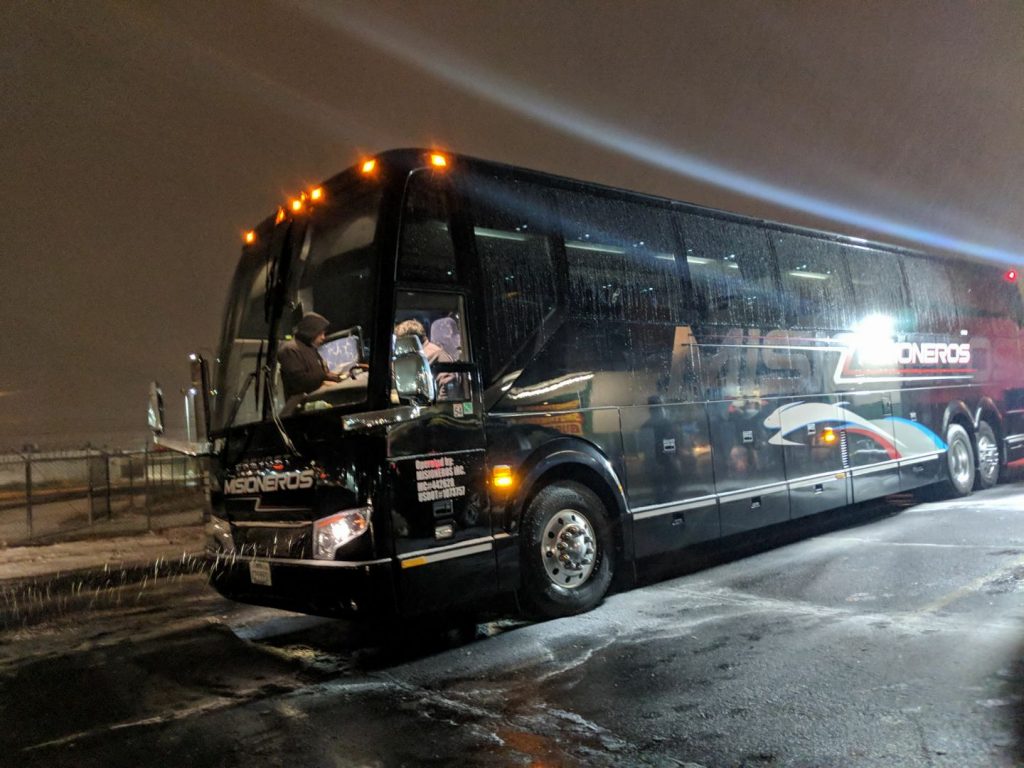 a Misioneros Bus Line charter bus preparing for a handful of bus rides across the country